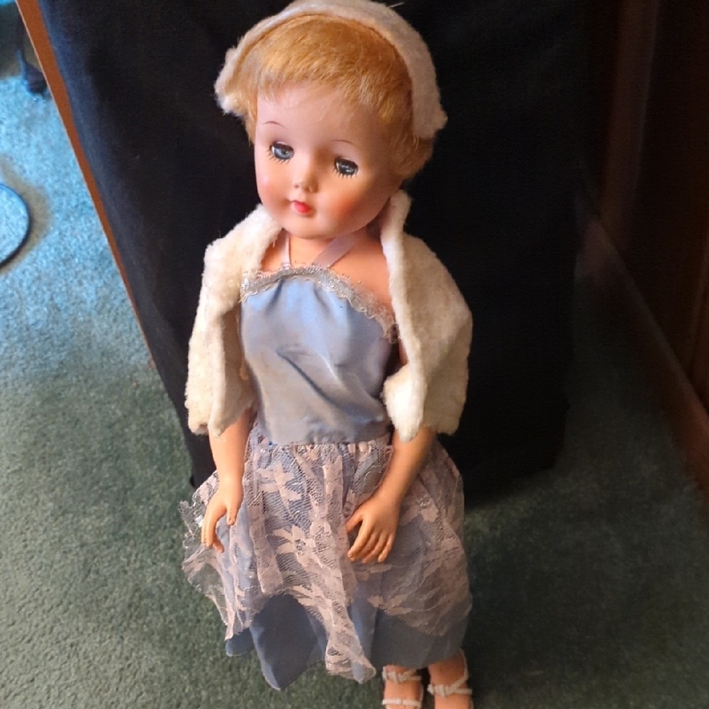 Elegant Blue and Cream Doll